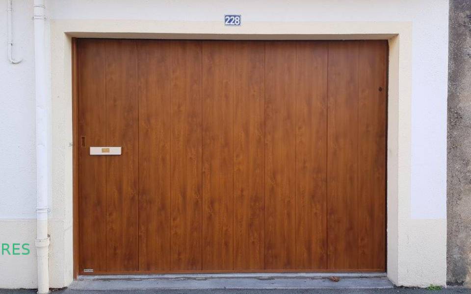 Porte de garage coulissante acier