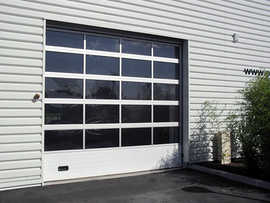 Vente porte de garage sectionnelle motorisée