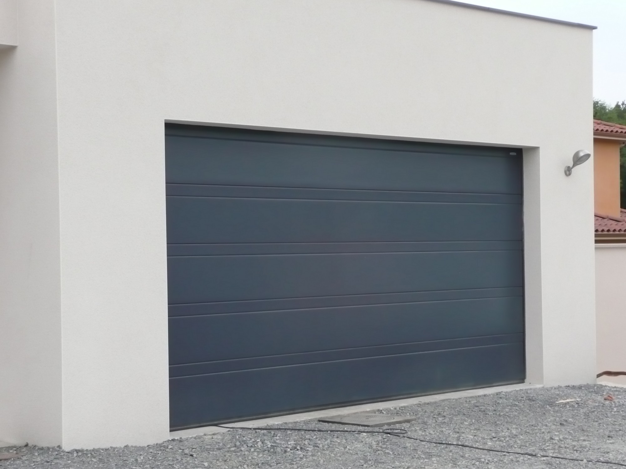 Porte de garage sectionnelle motorisée bigmat