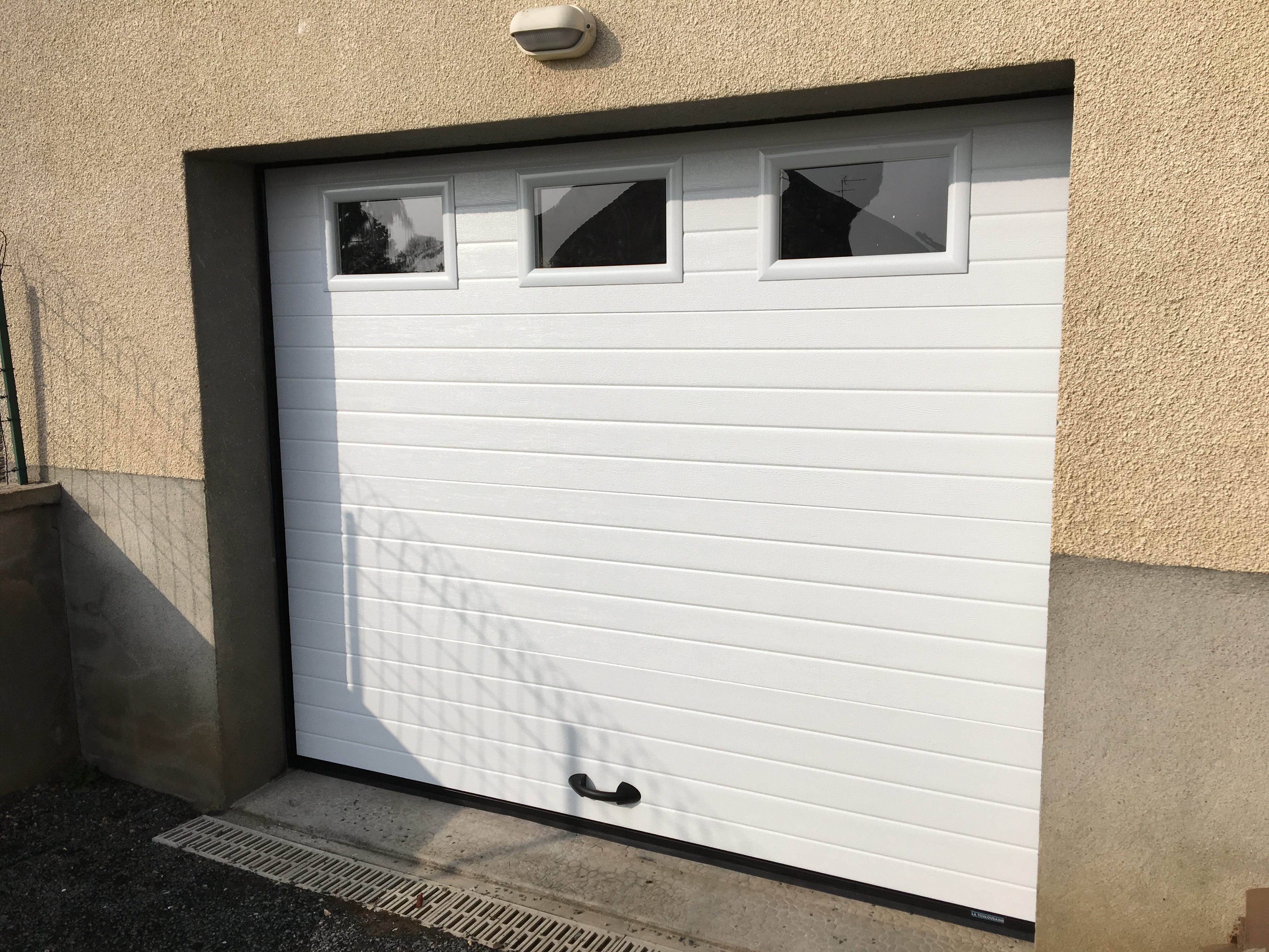 Porte de garage alu avec portillon