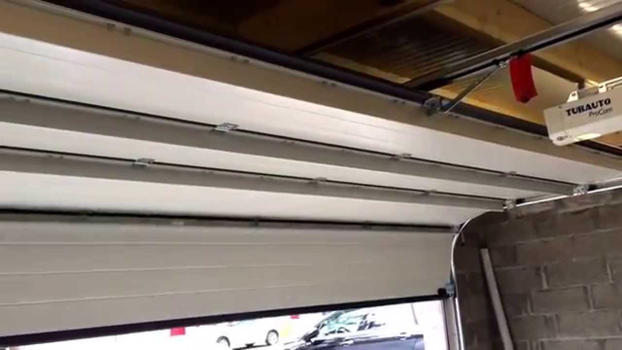 Prix motorisation porte de garage tubauto