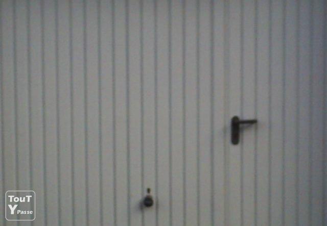 Porte de garage avec portillon integre tubauto