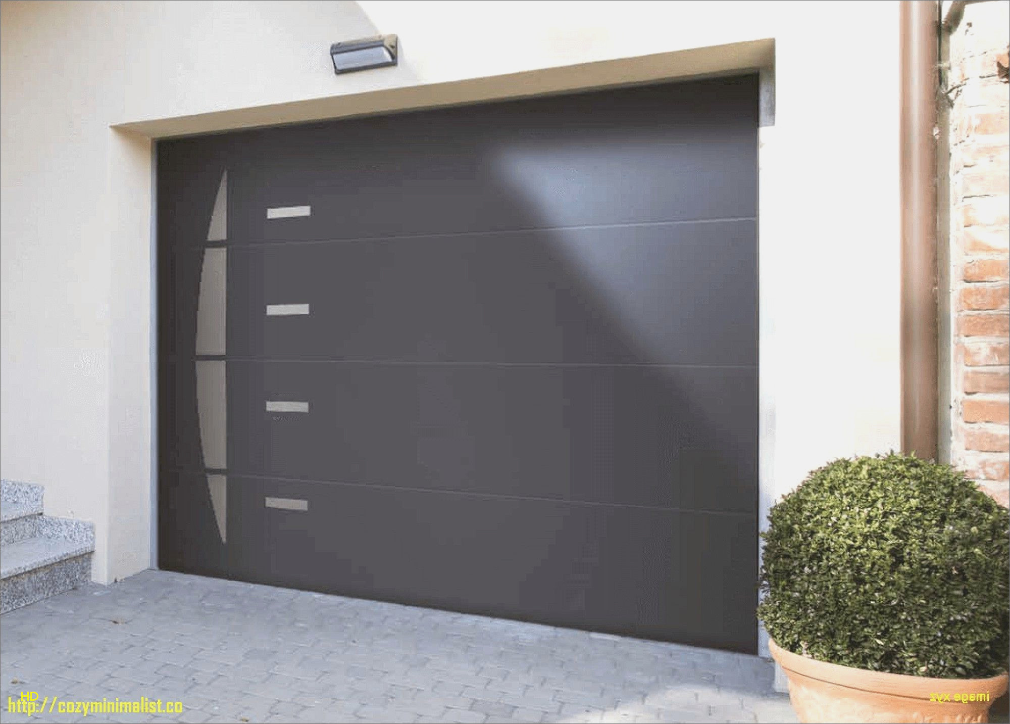 Porte de garage basculante débordante