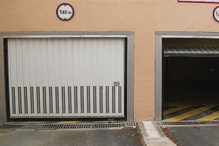 Porte de garage sectionnelle qui grince