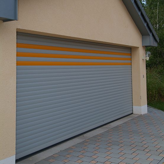 Porte de garage enroulable isolante