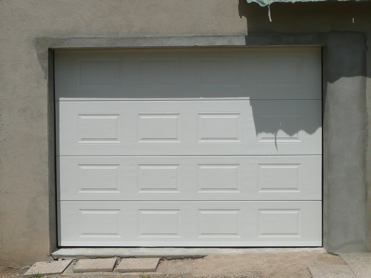 Porte de garage sectionnelle prix