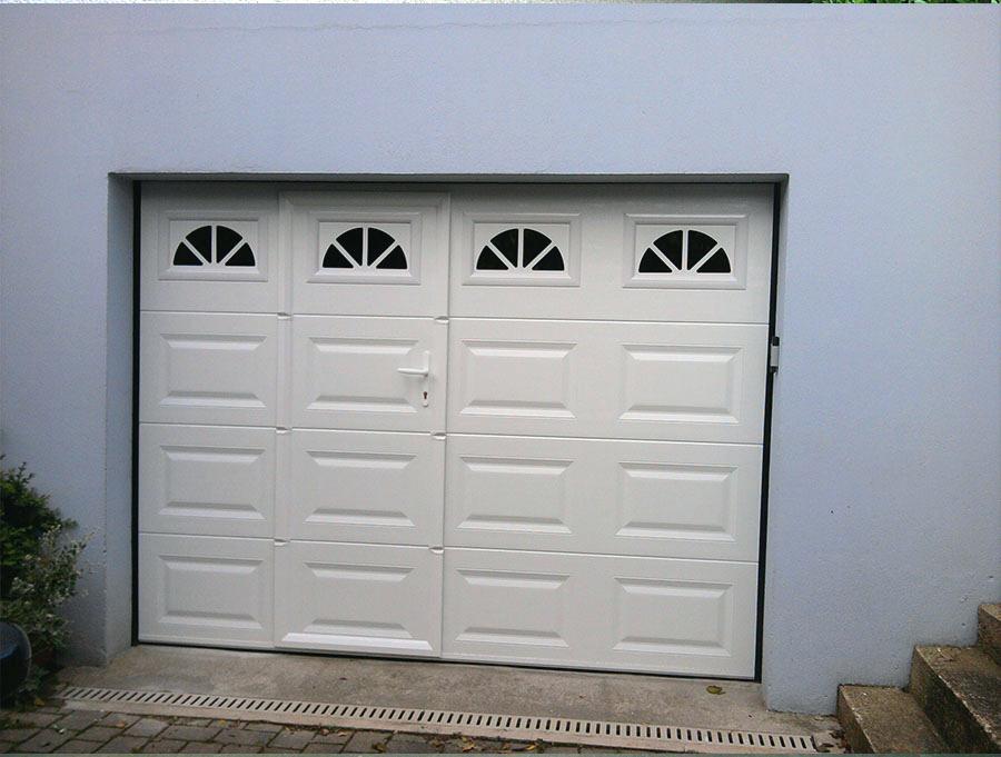 Prix porte de garage sectionnelle avec portillon la toulousaine