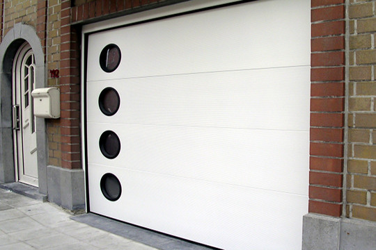 Porte de garage sectionnelle avec portillon clermont ferrand
