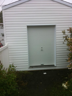 Porte de garage coulissante castorama
