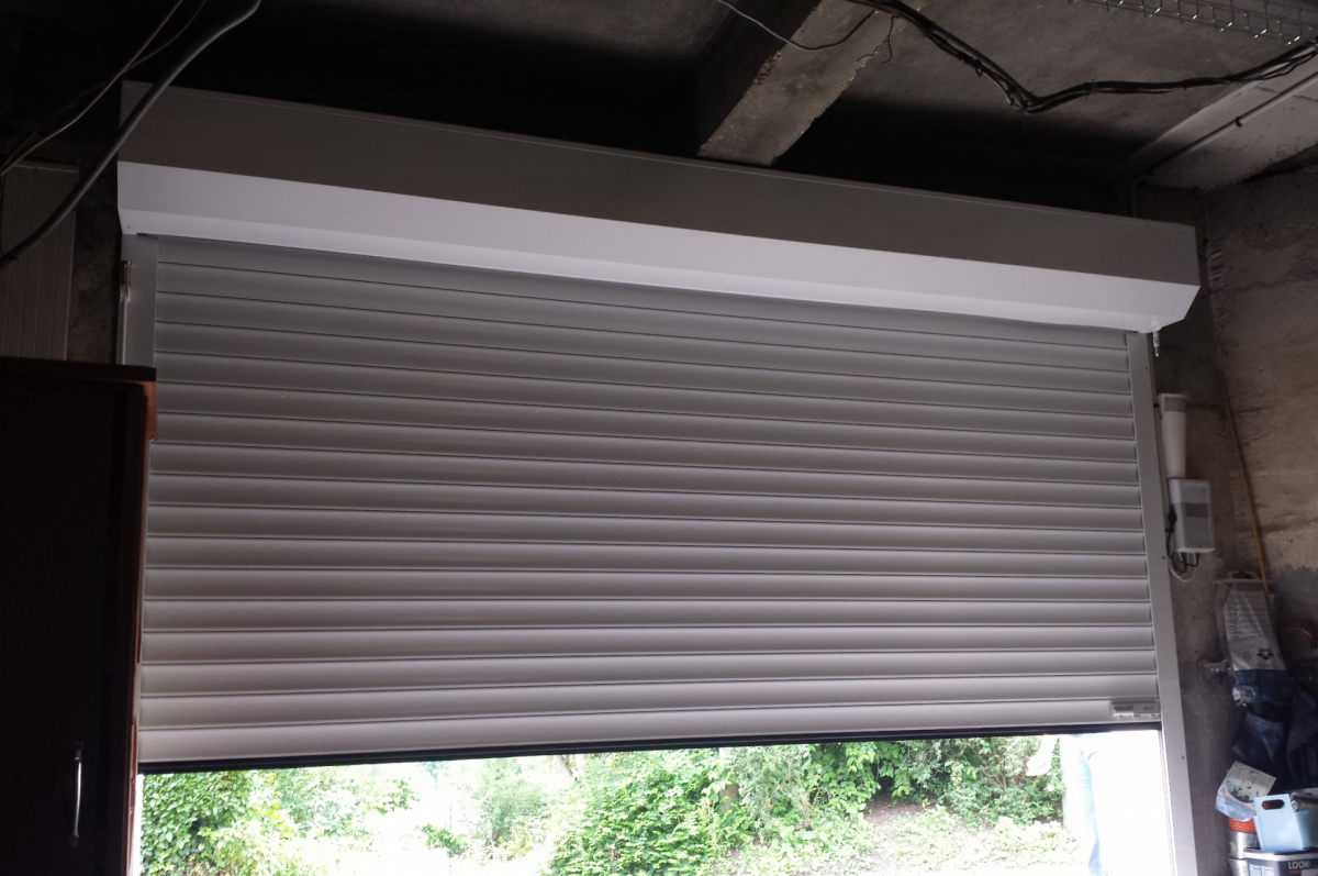 Prix porte de garage a enroulement sur mesure