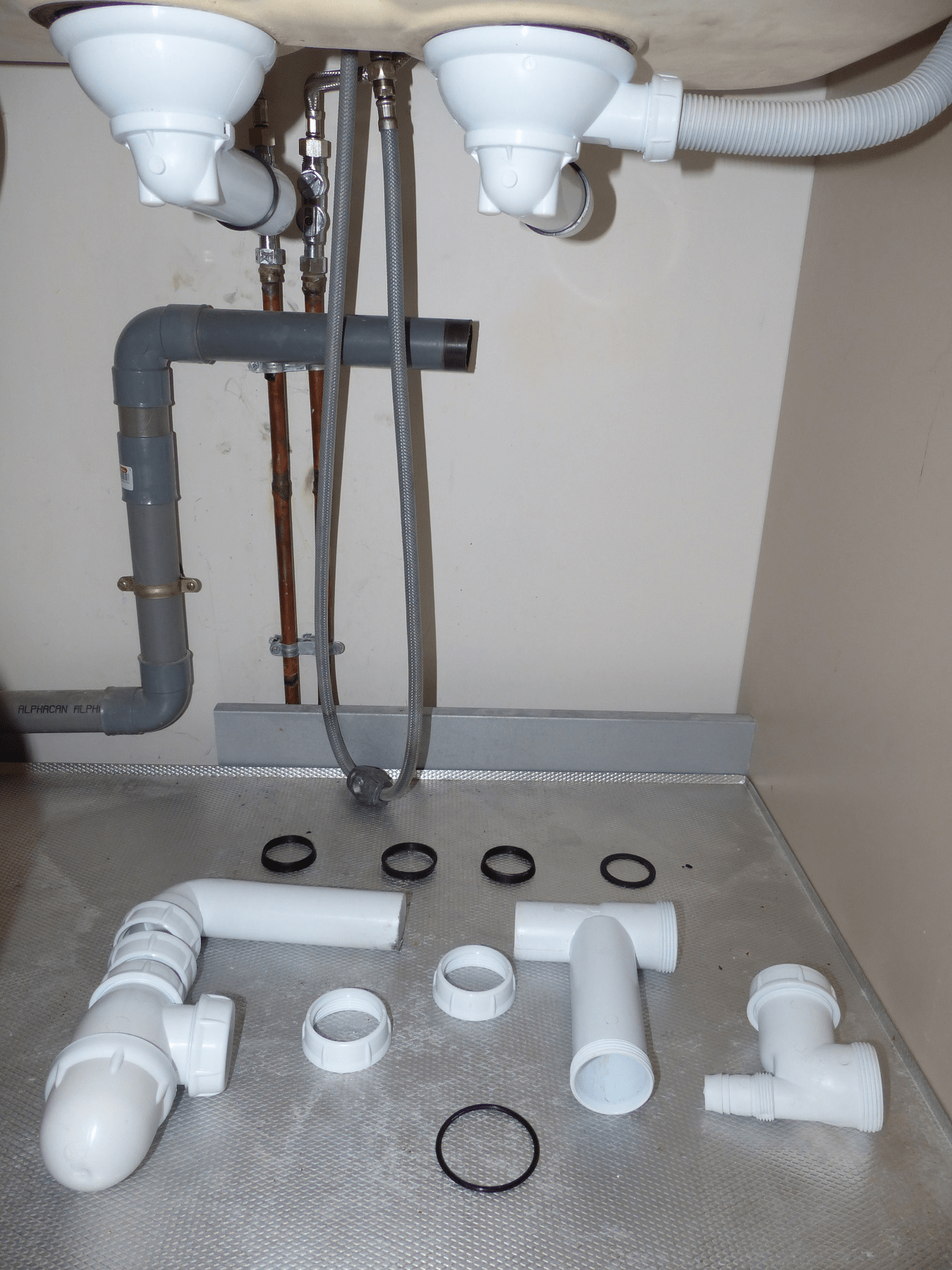 Montage syphon evier cuisine